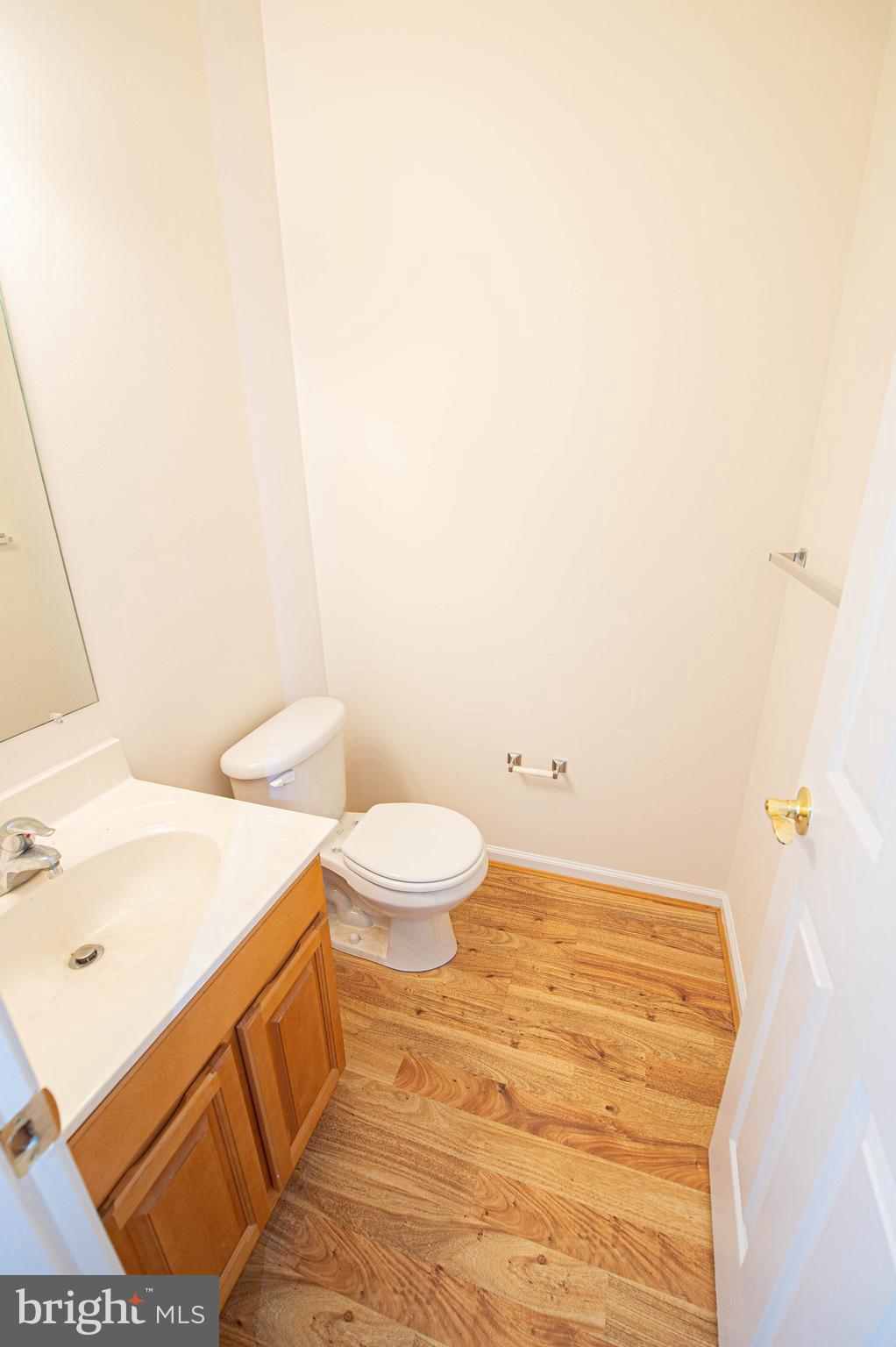 438 Parkview Court, Unit E Salisbury, MD 21804 - Photo 22 of 95 a bathroom with a sink a toilet and a mirror