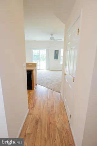 a view of a kitchen with a refrigerator a sink and dishwasher