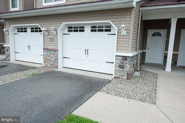 a view of a swimming pool with a yard