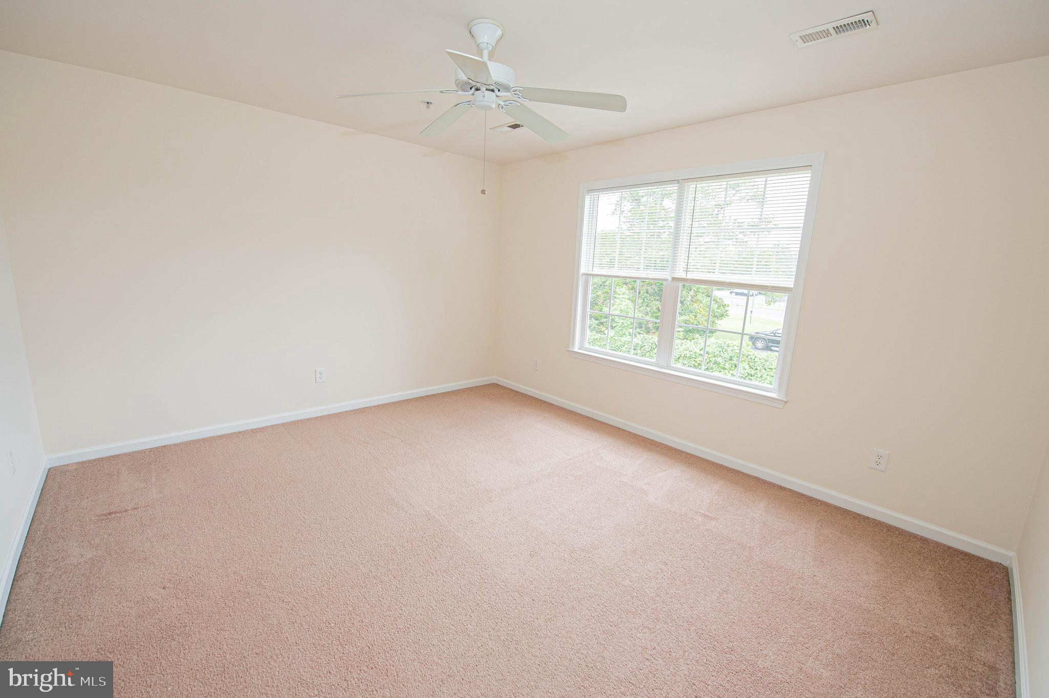 438 Parkview Court, Unit E Salisbury, MD 21804 - Photo 67 of 95 an empty room with a window