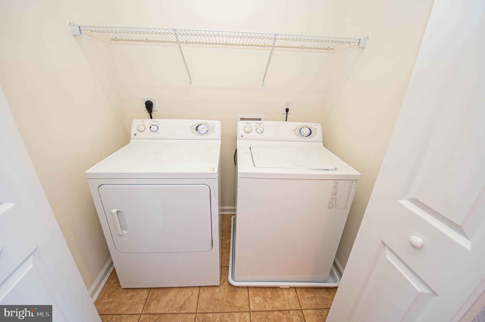 438 Parkview Court, Unit E Salisbury, MD 21804 - Photo 80 of 95 a utility room with dryer and washer