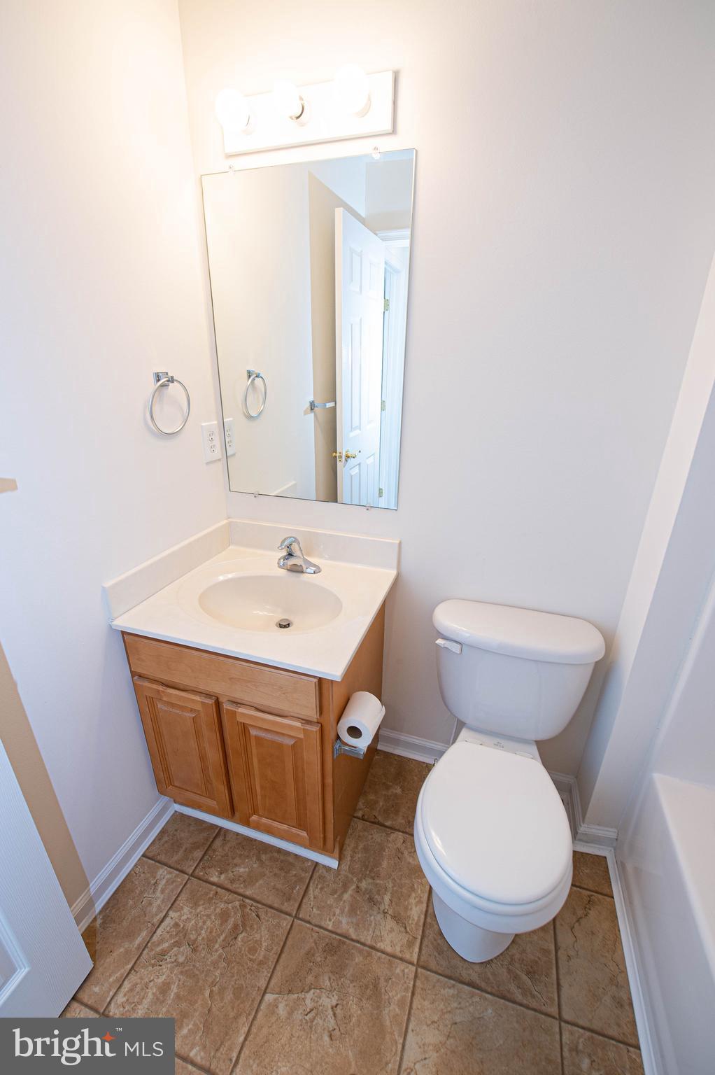 438 Parkview Court, Unit E Salisbury, MD 21804 - Photo 82 of 95 a bathroom with a sink and a toilet