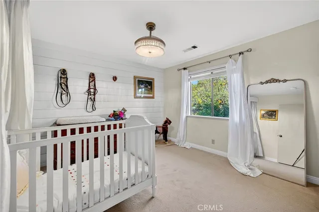 a living room with a couch and a table