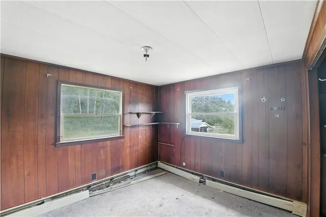 an empty room with windows