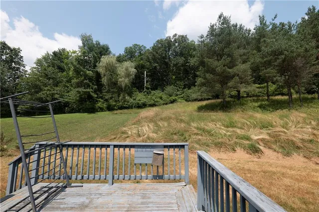 a view of backyard of a house