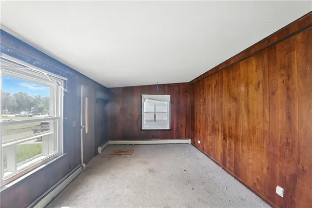 a view of an empty room and window