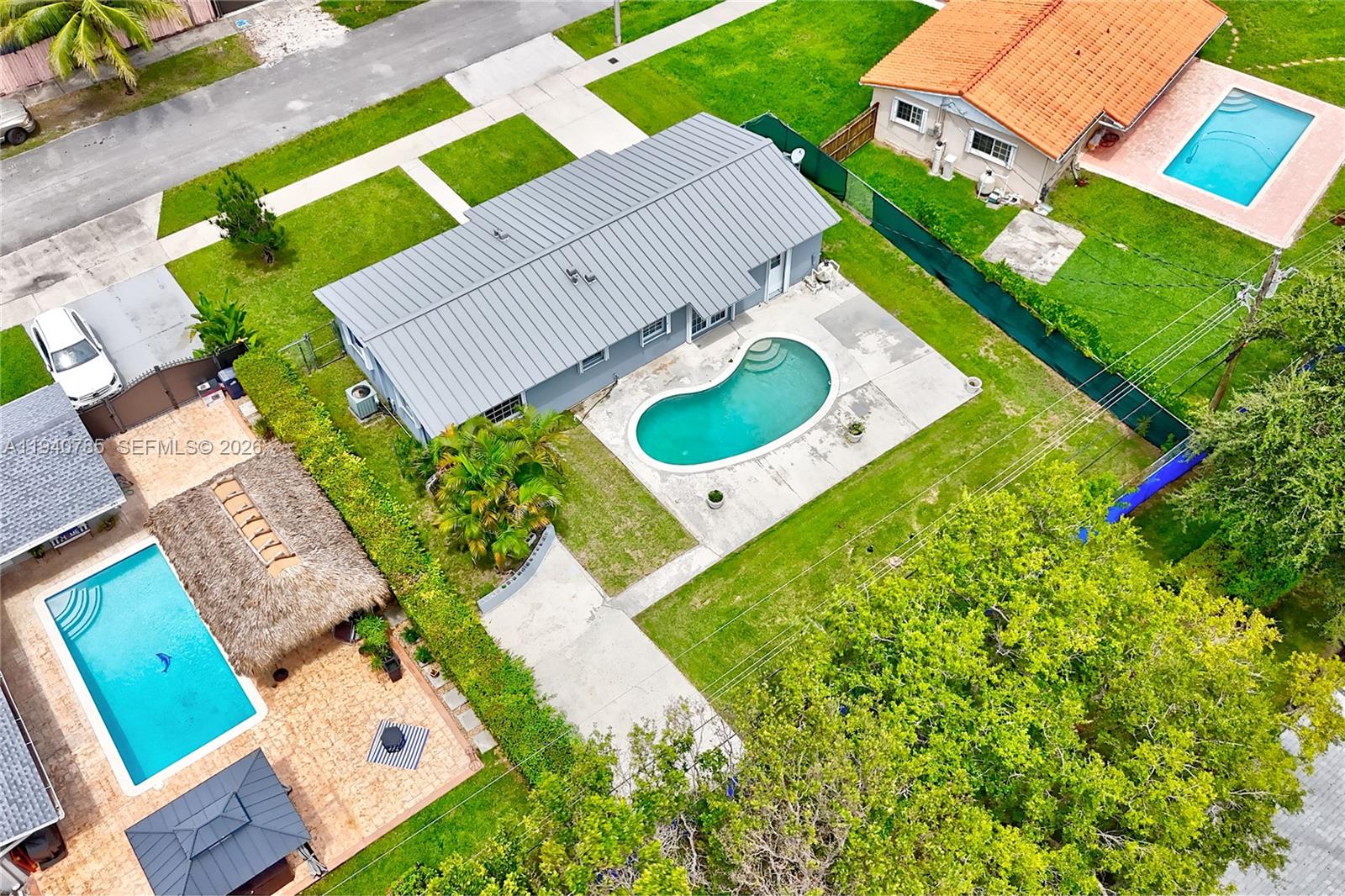5725 Southwest 107th Place Miami, FL 33173 - Photo 21 of 21 an aerial view of a house with a yard