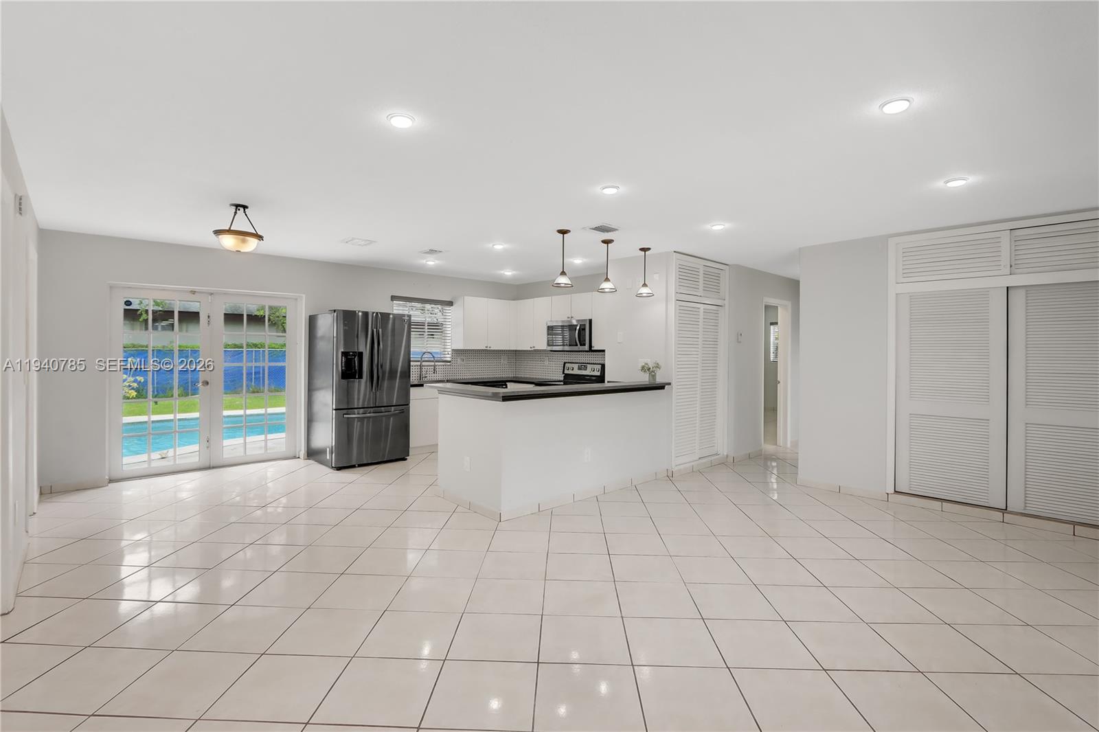 5725 Southwest 107th Place Miami, FL 33173 - Photo 6 of 21 a view of kitchen appliances with cabinets