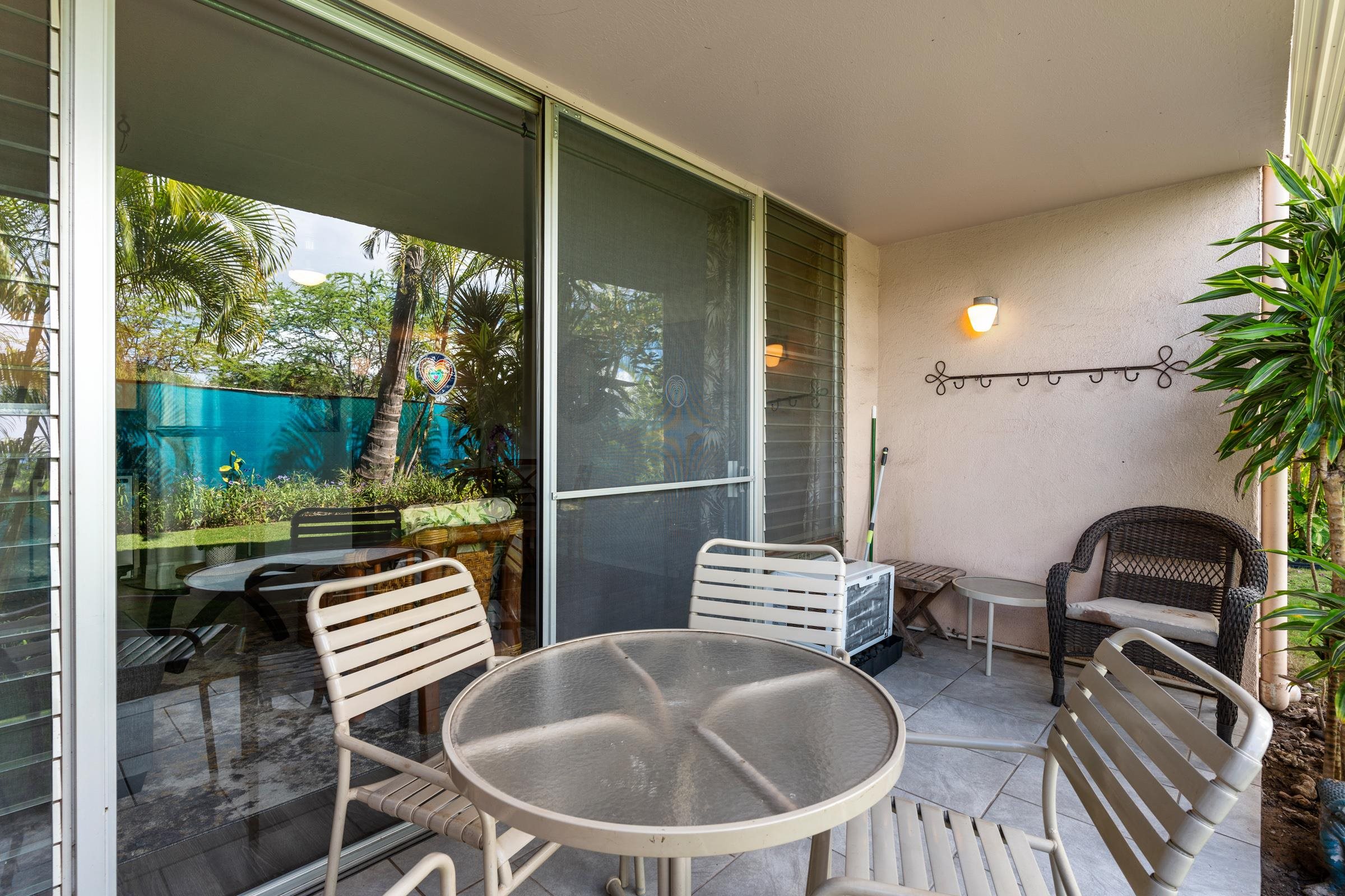 2495 South Kihei Road, Unit 155 Kihei, HI 96753 - Photo 18 of 33 a balcony with chairs and a potted plant