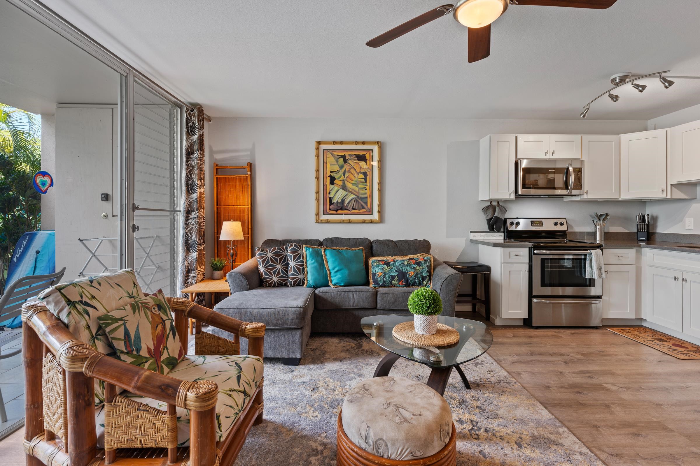 2495 South Kihei Road, Unit 155 Kihei, HI 96753 - Photo 2 of 33 a living room with furniture kitchen view and a window
