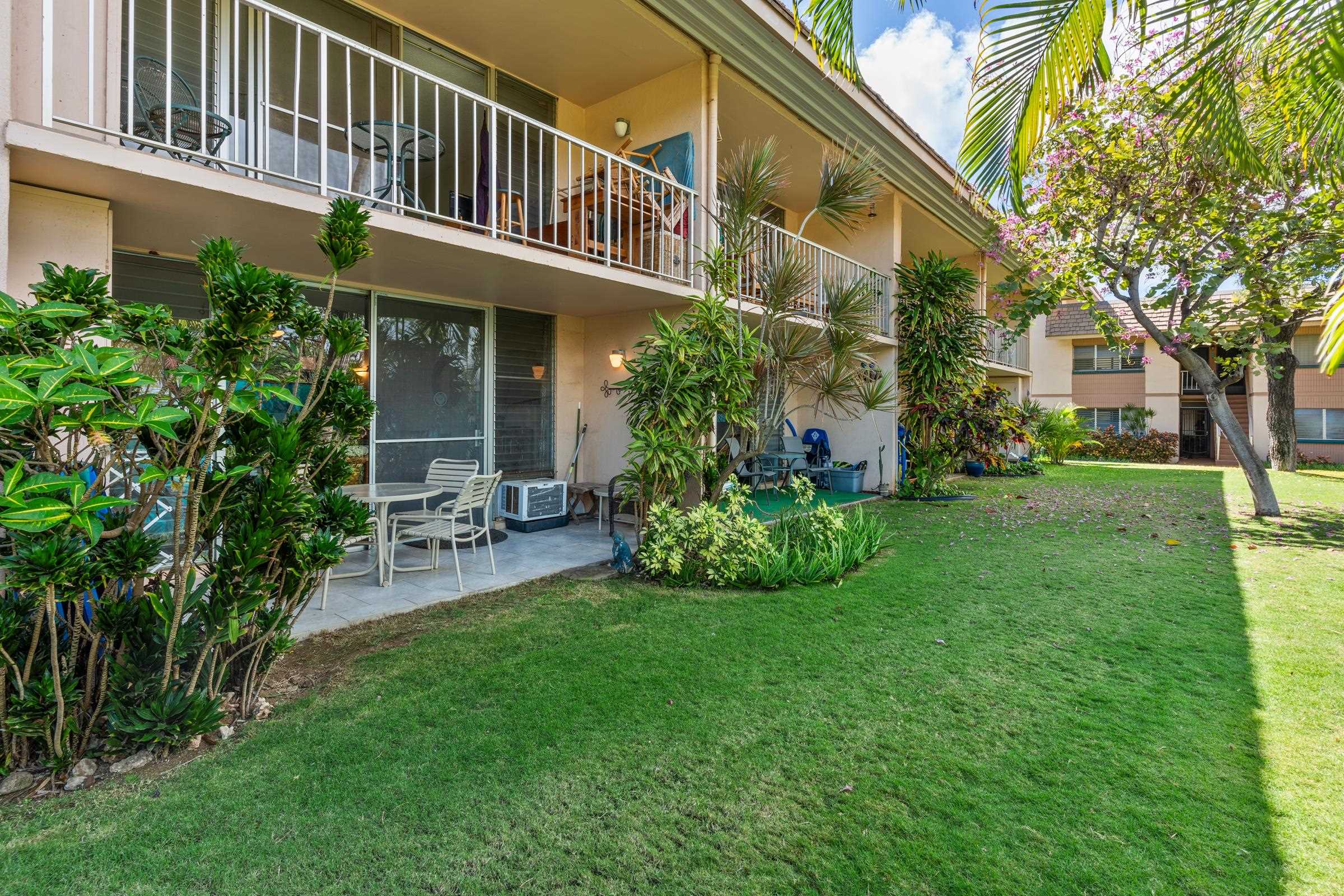 2495 South Kihei Road, Unit 155 Kihei, HI 96753 - Photo 21 of 33 a view of a house with a yard and sitting area
