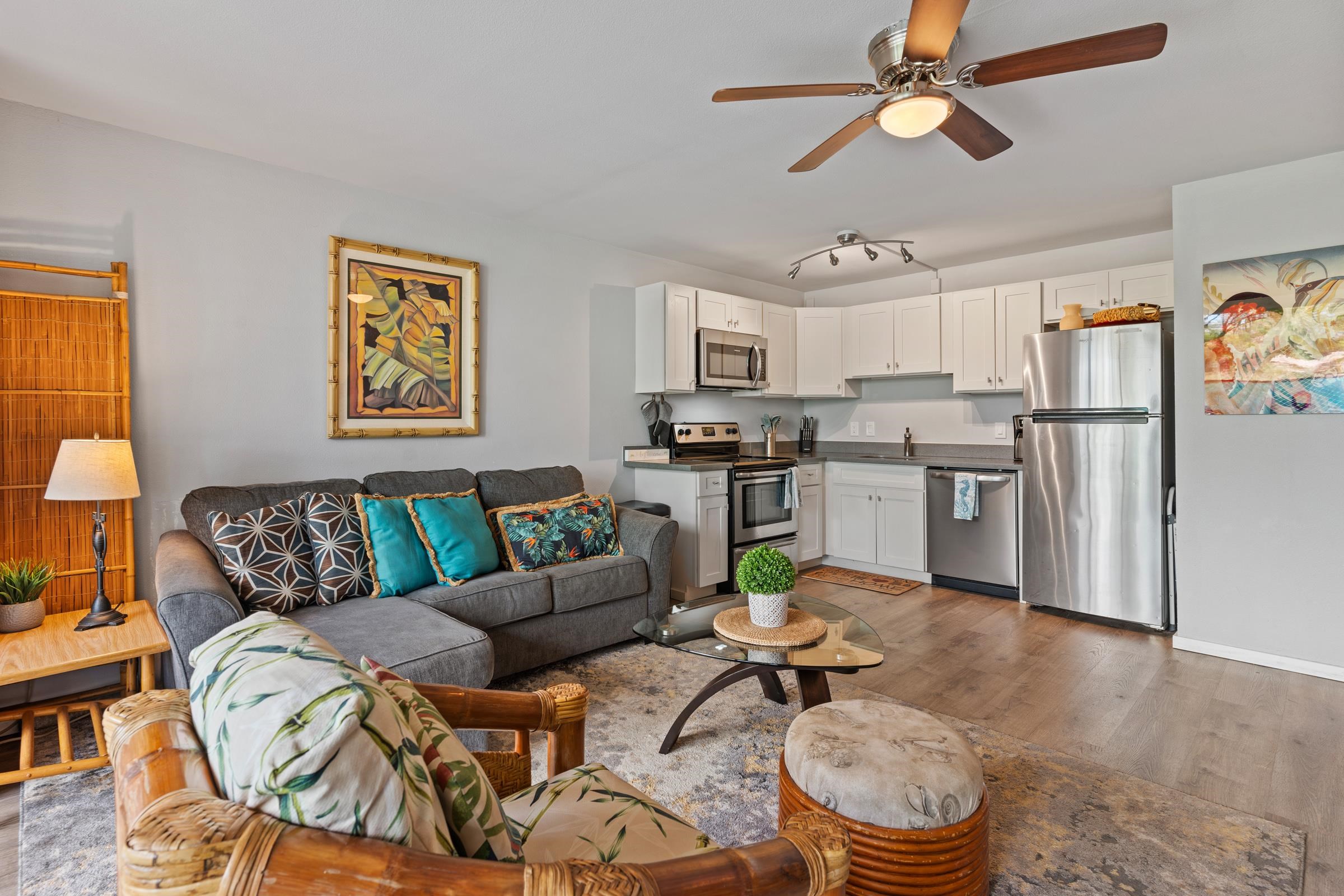 2495 South Kihei Road, Unit 155 Kihei, HI 96753 - Photo 7 of 33 a living room with stainless steel appliances kitchen island granite countertop furniture and a window