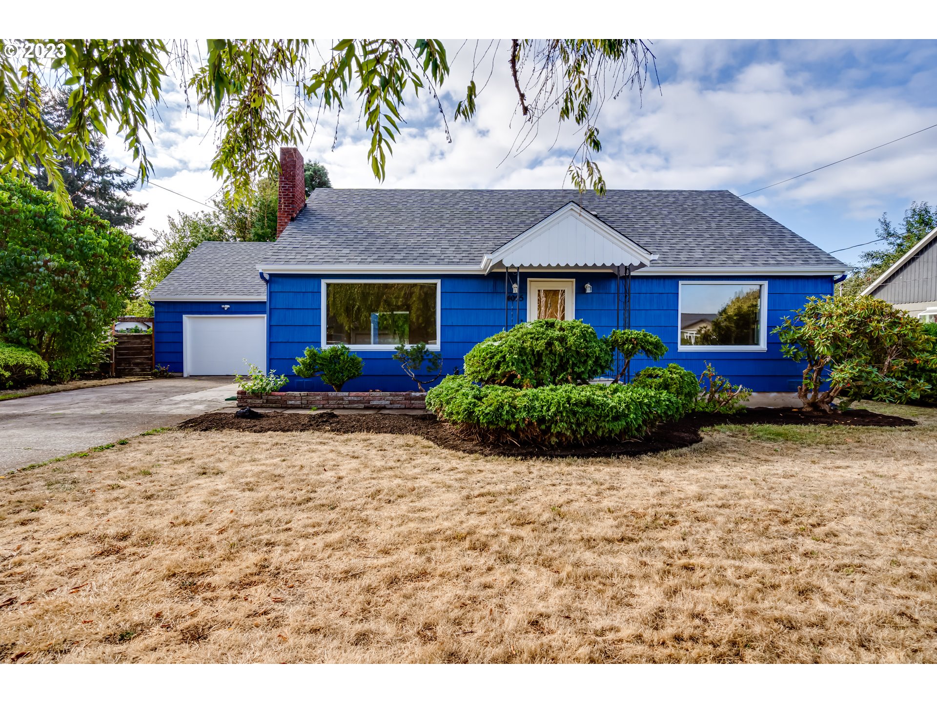 4055 North Street Springfield, OR 97478 - Photo 1 of 48 front view of a house with a yard