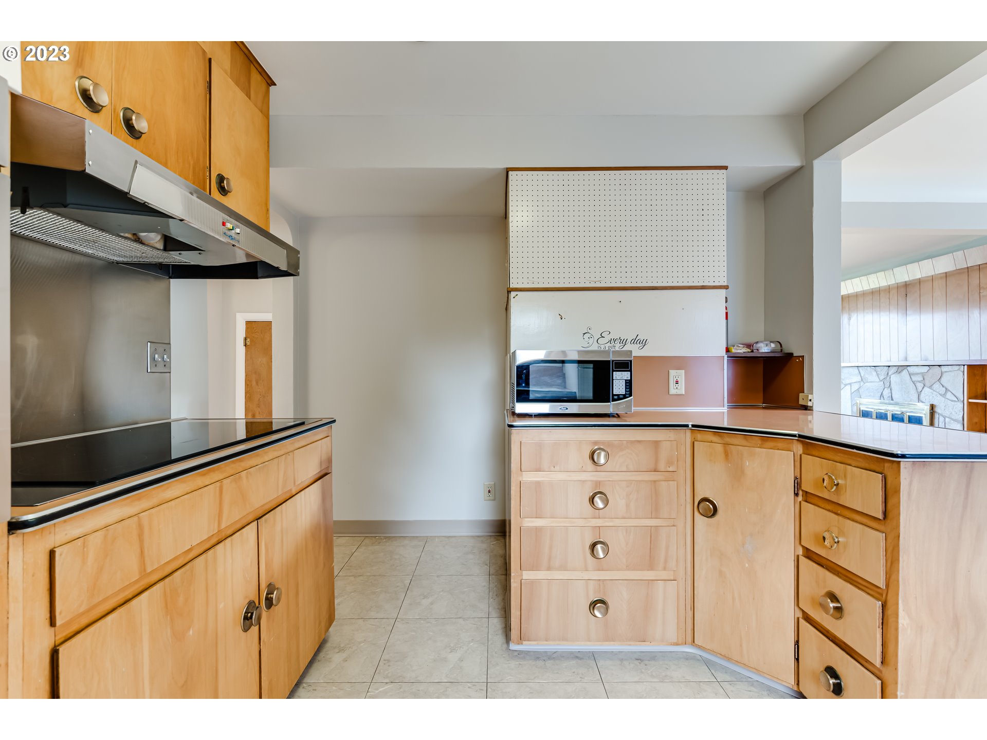 4055 North Street Springfield, OR 97478 - Photo 15 of 48 a kitchen with stainless steel appliances a sink and cabinets