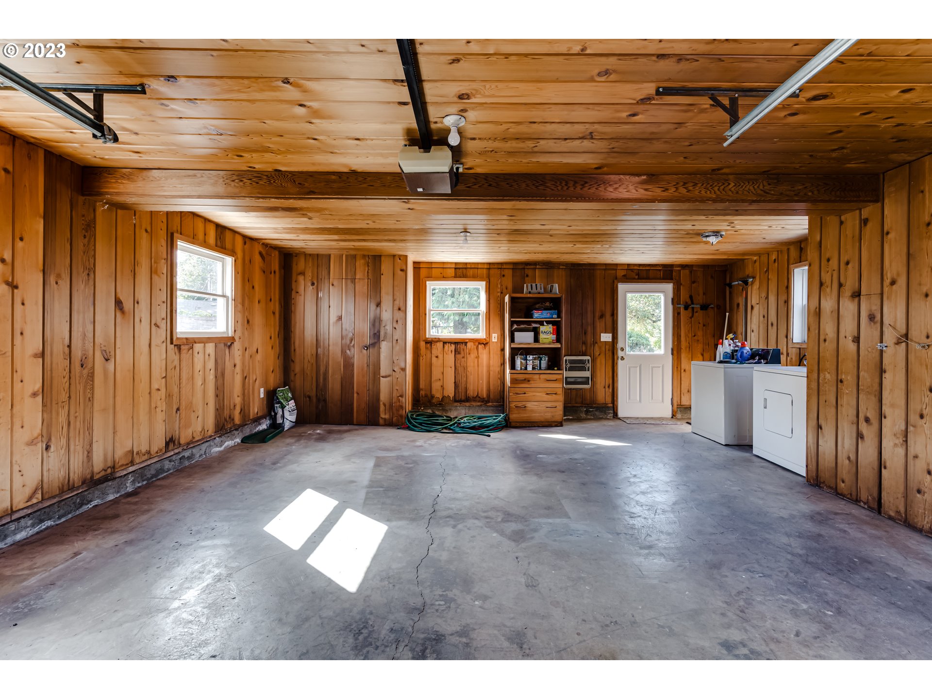 4055 North Street Springfield, OR 97478 - Photo 39 of 48 a view of a hallway with wooden floor and a cabinet