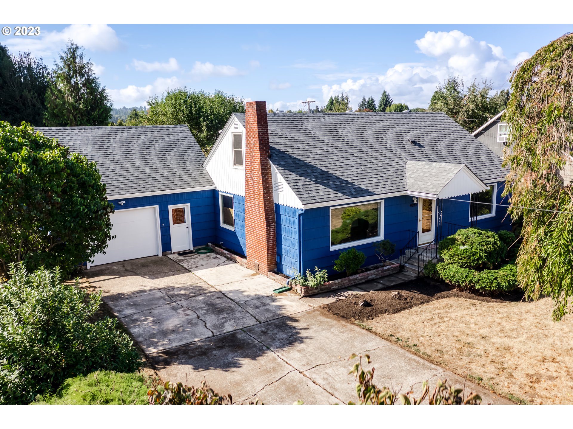 4055 North Street Springfield, OR 97478 - Photo 42 of 48 a aerial view of a house with a yard