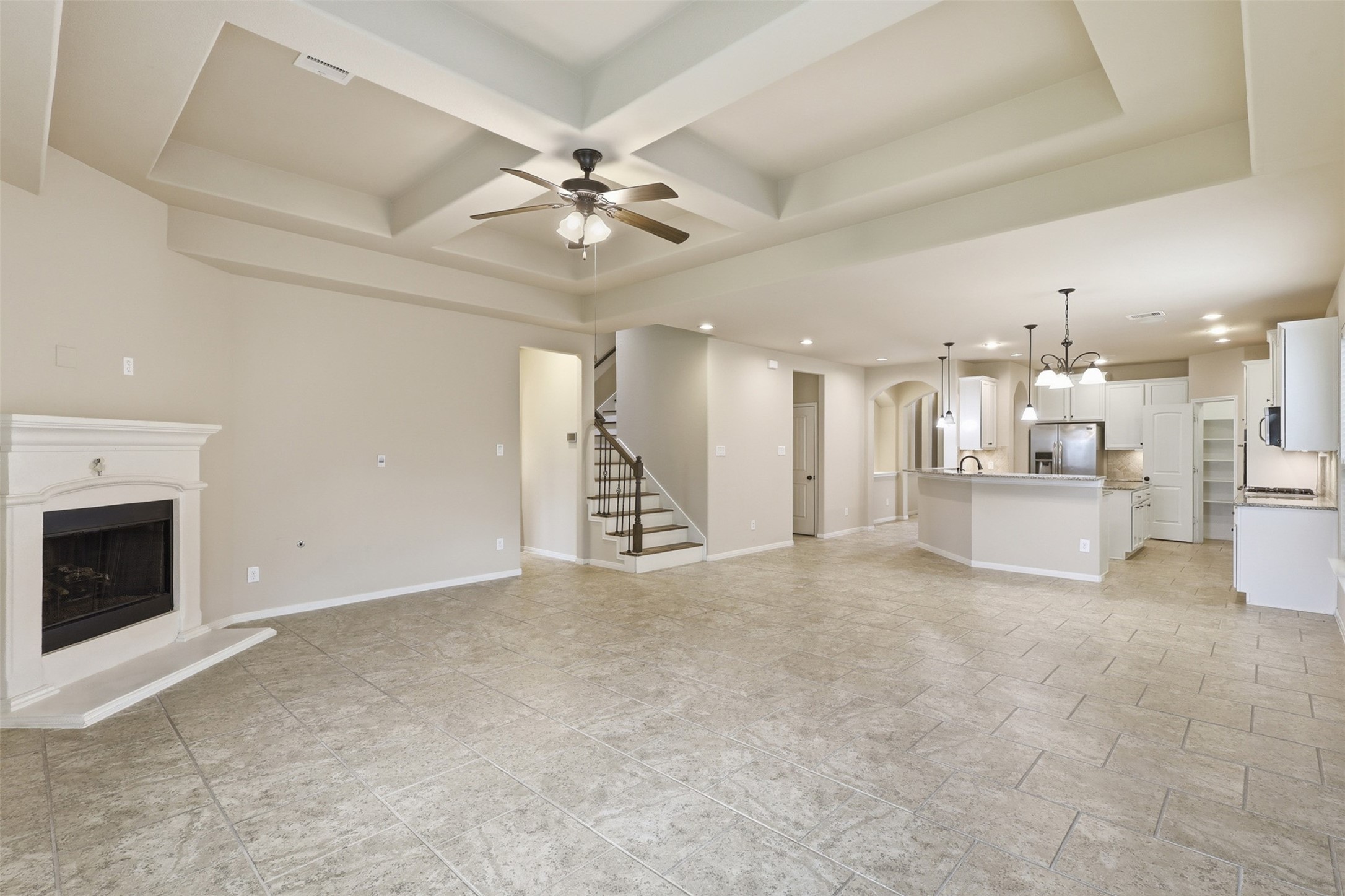 22943 Dale River Road Tomball, TX 77375 - Photo 10 of 29 a view of an empty room with a fireplace