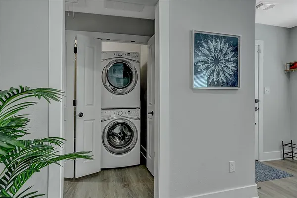 a bedroom with a bed and cabinets