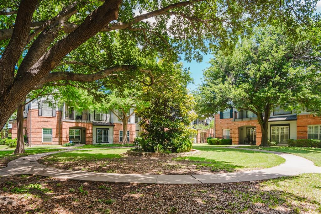 2524 Preston Road, Unit 808 Plano, TX 75093 - Photo 5 of 31 Landscaped courtyard directly in front of unit.