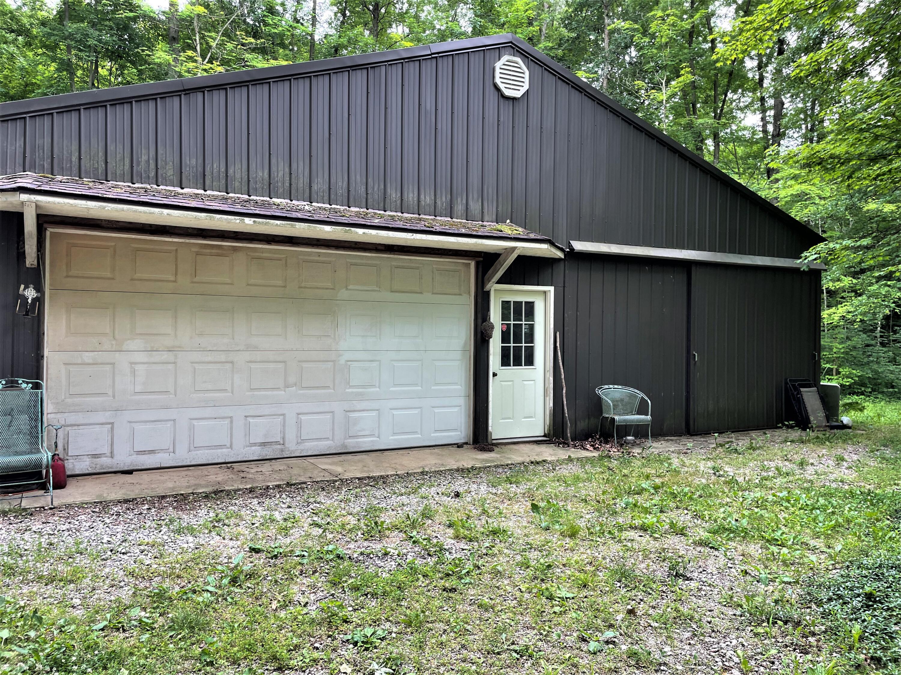 Includes Concrete Flr., Electric, Workshop and Sliding Bay