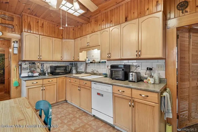 a balcony with table and chairs