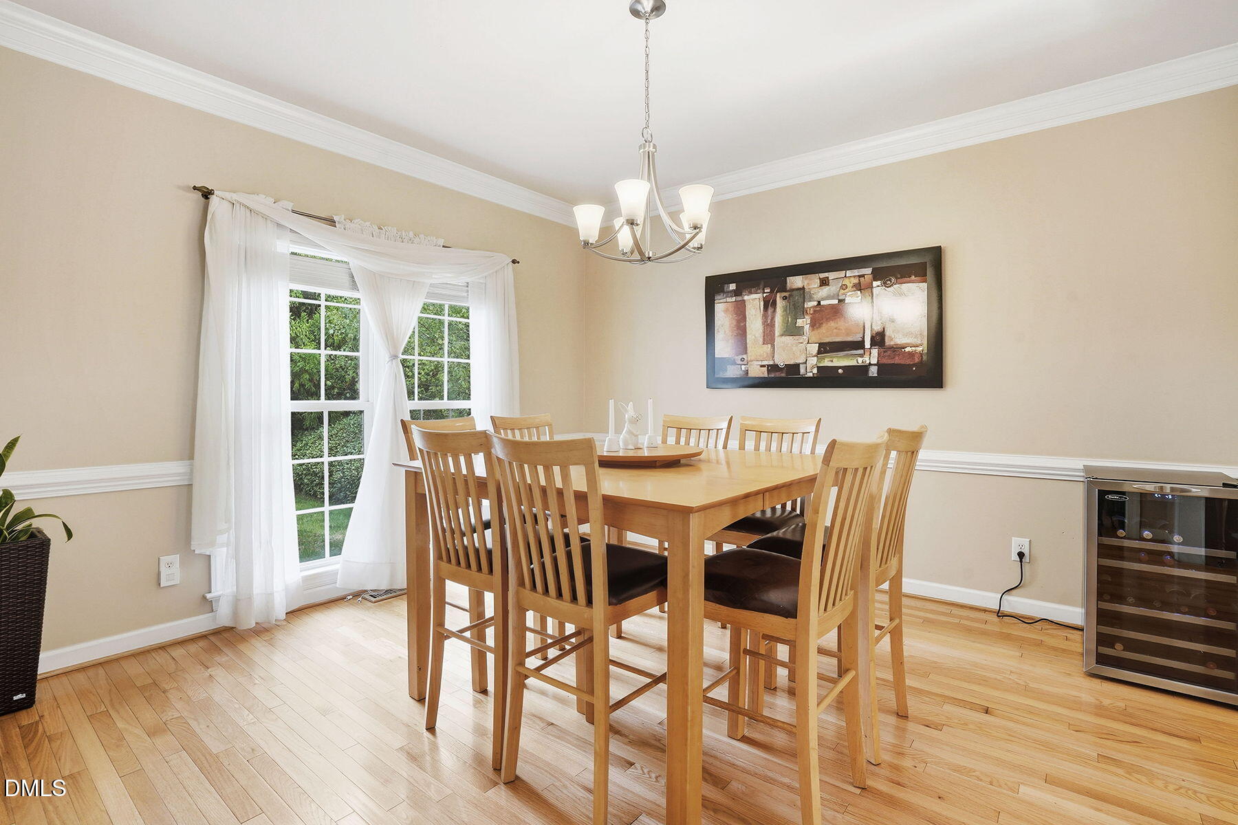 1012 Clatter Avenue Wake Forest, NC 27587 - Photo 11 of 34 a view of a dining room with furniture wooden floor and chandelier