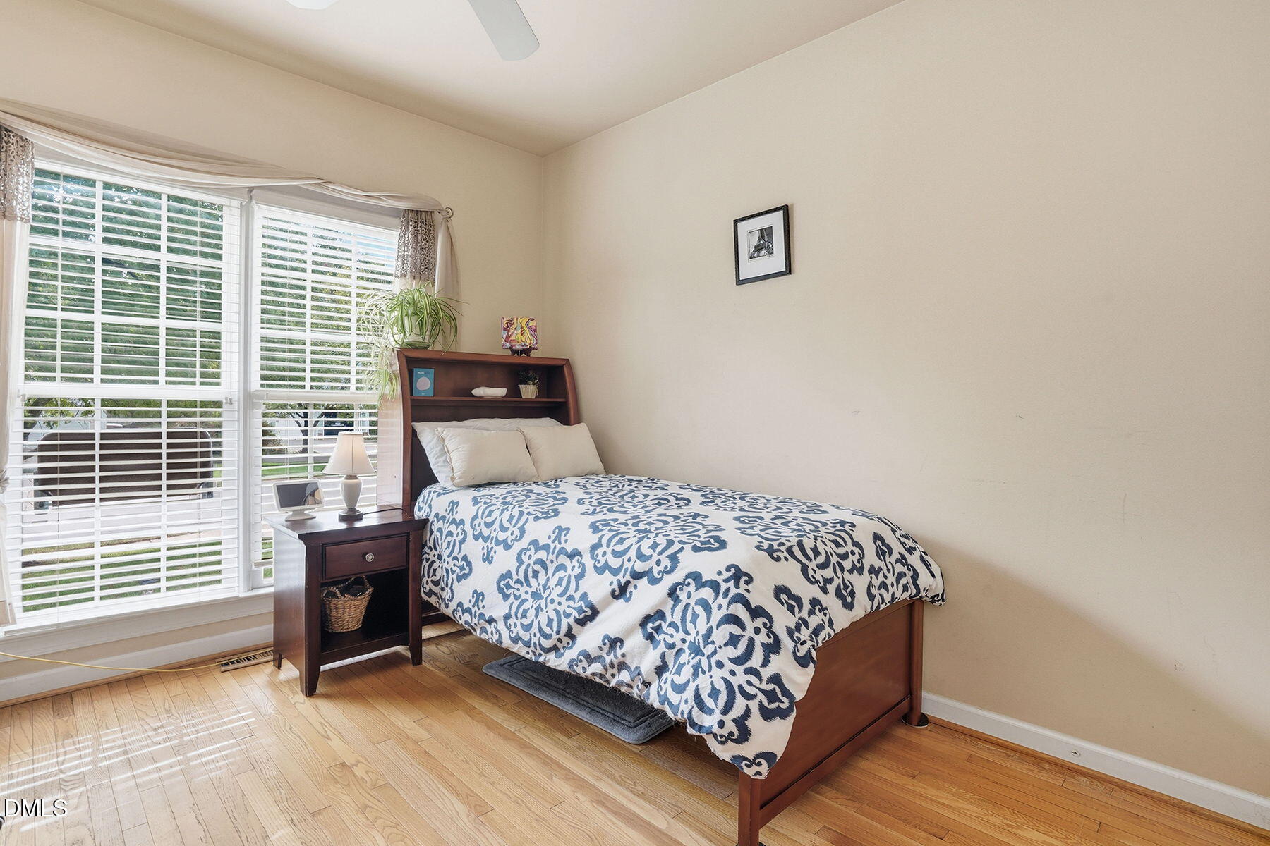 1012 Clatter Avenue Wake Forest, NC 27587 - Photo 16 of 34 a bedroom with a bed and a window