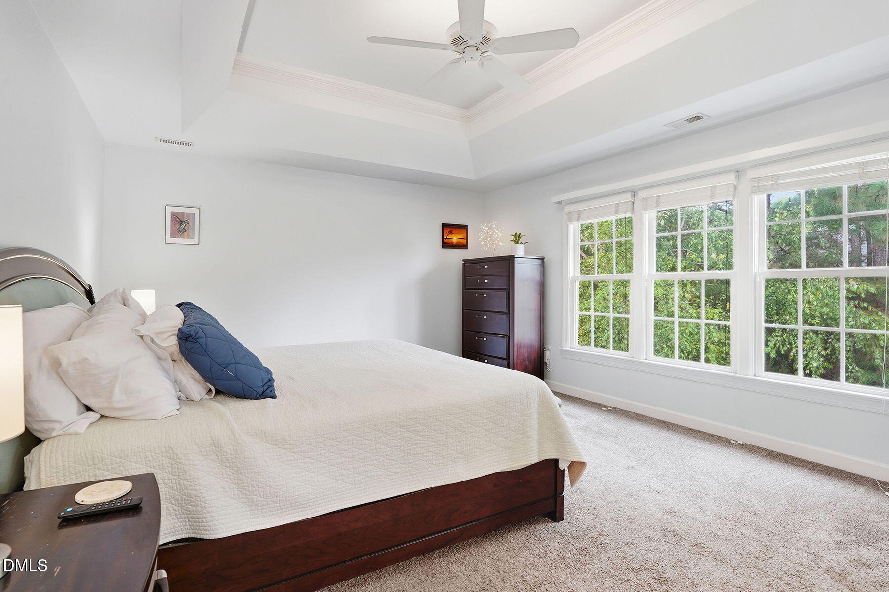1012 Clatter Avenue Wake Forest, NC 27587 - Photo 19 of 34 a bed sitting in a bedroom next to a window