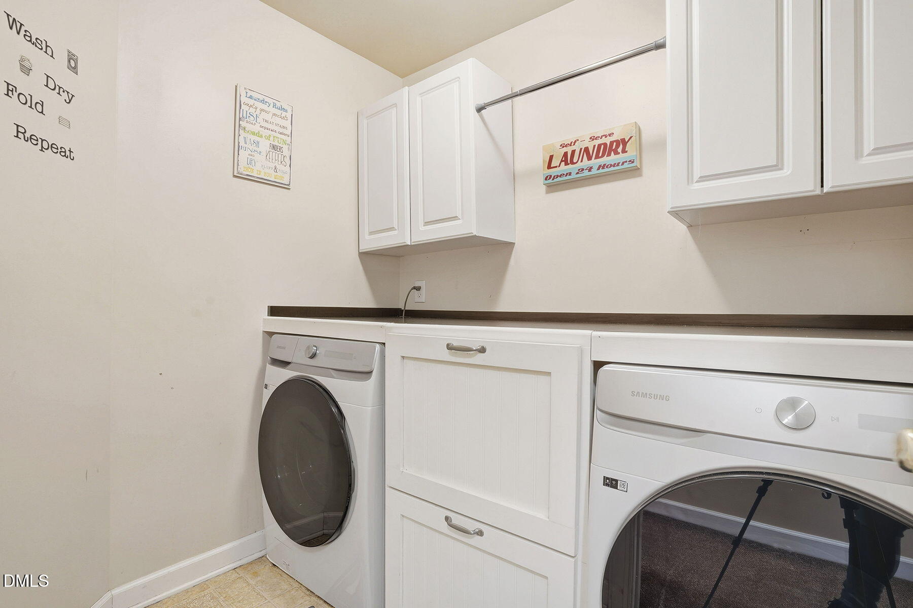 1012 Clatter Avenue Wake Forest, NC 27587 - Photo 27 of 34 a close up view of a washer and dryer