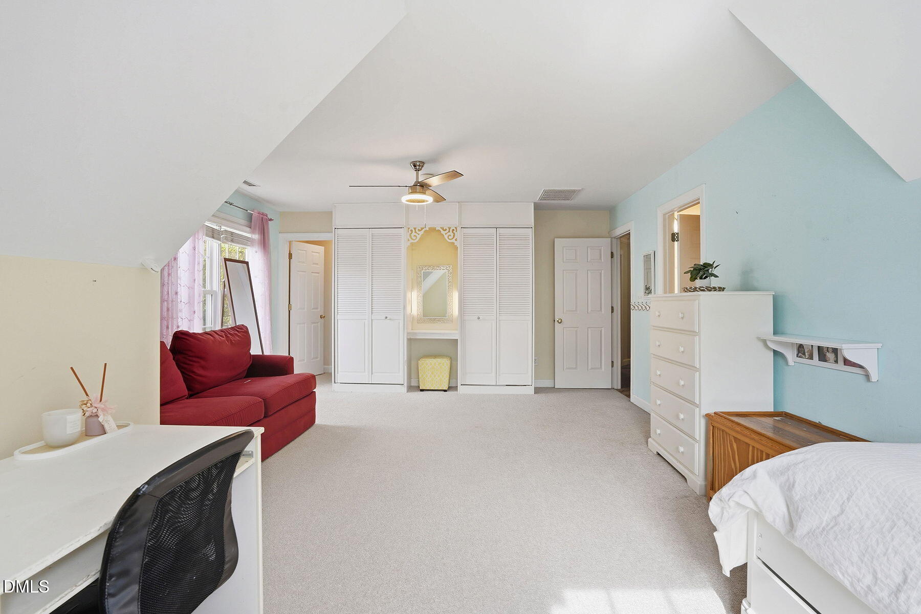 1012 Clatter Avenue Wake Forest, NC 27587 - Photo 29 of 34 a living room with furniture and a chandelier