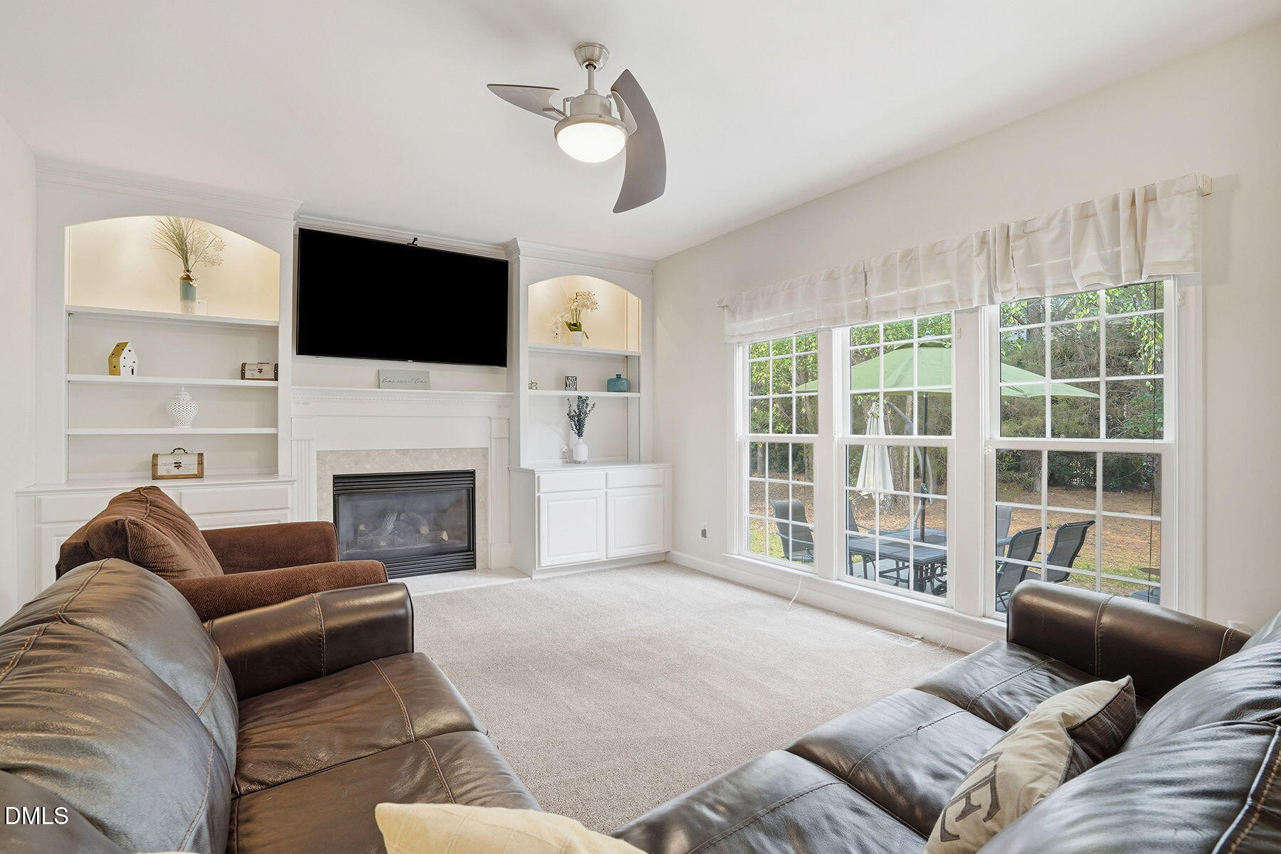 1012 Clatter Avenue Wake Forest, NC 27587 - Photo 5 of 34 a living room with furniture fireplace and flat screen tv