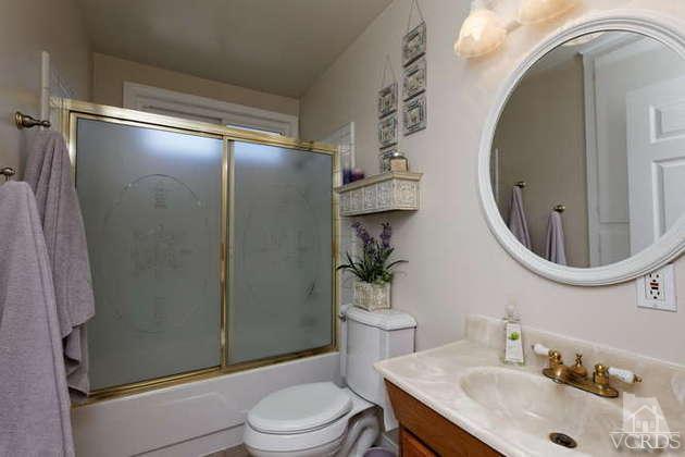 741 Appleton Road Simi Valley, CA 93065 - Photo 12 of 22 a bathroom with a sink toilet and shower