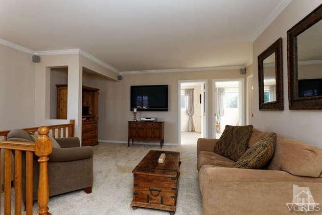 741 Appleton Road Simi Valley, CA 93065 - Photo 14 of 22 a living room with furniture and a flat screen tv