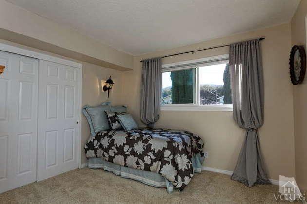 741 Appleton Road Simi Valley, CA 93065 - Photo 17 of 22 a bedroom with a bed and a window