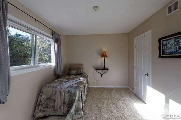 741 Appleton Road Simi Valley, CA 93065 - Photo 18 of 22 a bedroom with a bed and a window