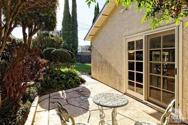741 Appleton Road Simi Valley, CA 93065 - Photo 22 of 22 a view of a chairs and table in the back yard of a house