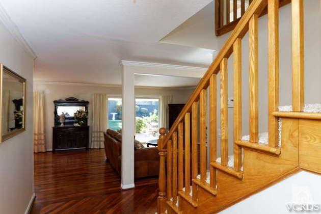 741 Appleton Road Simi Valley, CA 93065 - Photo 6 of 22 a view of an entryway with wooden floor and stairs