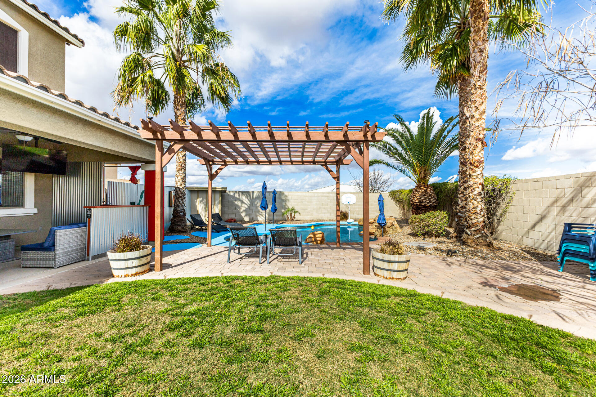 24541 Plum Road Florence, AZ 85132 - Photo 45 of 47 a view of a backyard with a patio and a garden