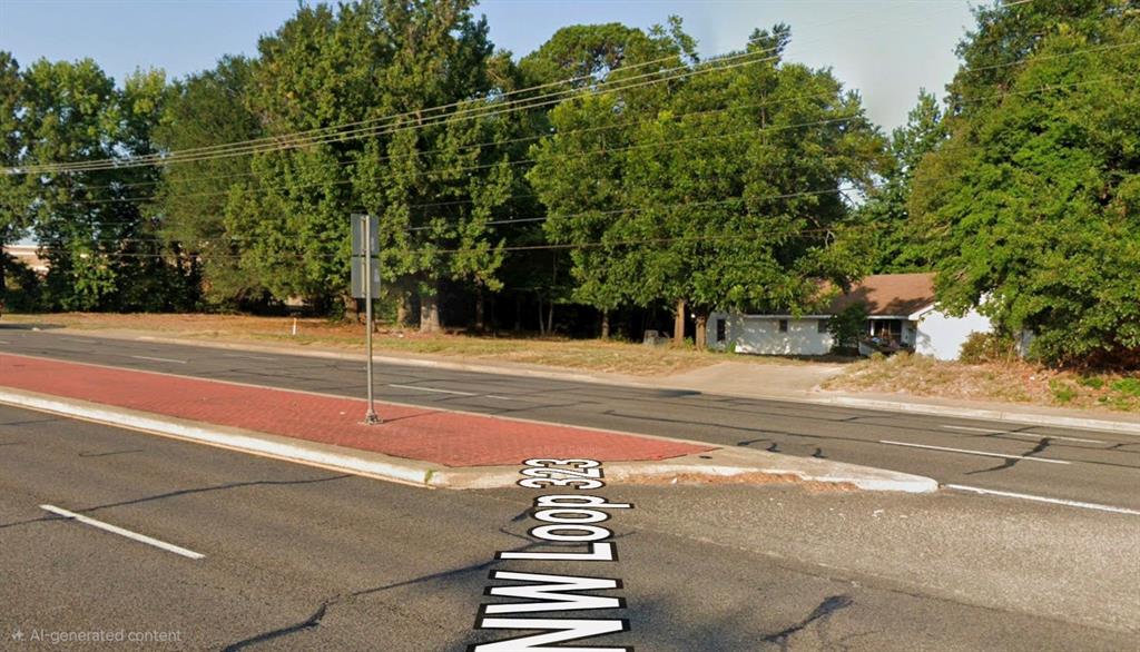 1228 North Northwest Loop 323 Tyler, TX 75702 - Photo 12 of 12 a view of a tennis court