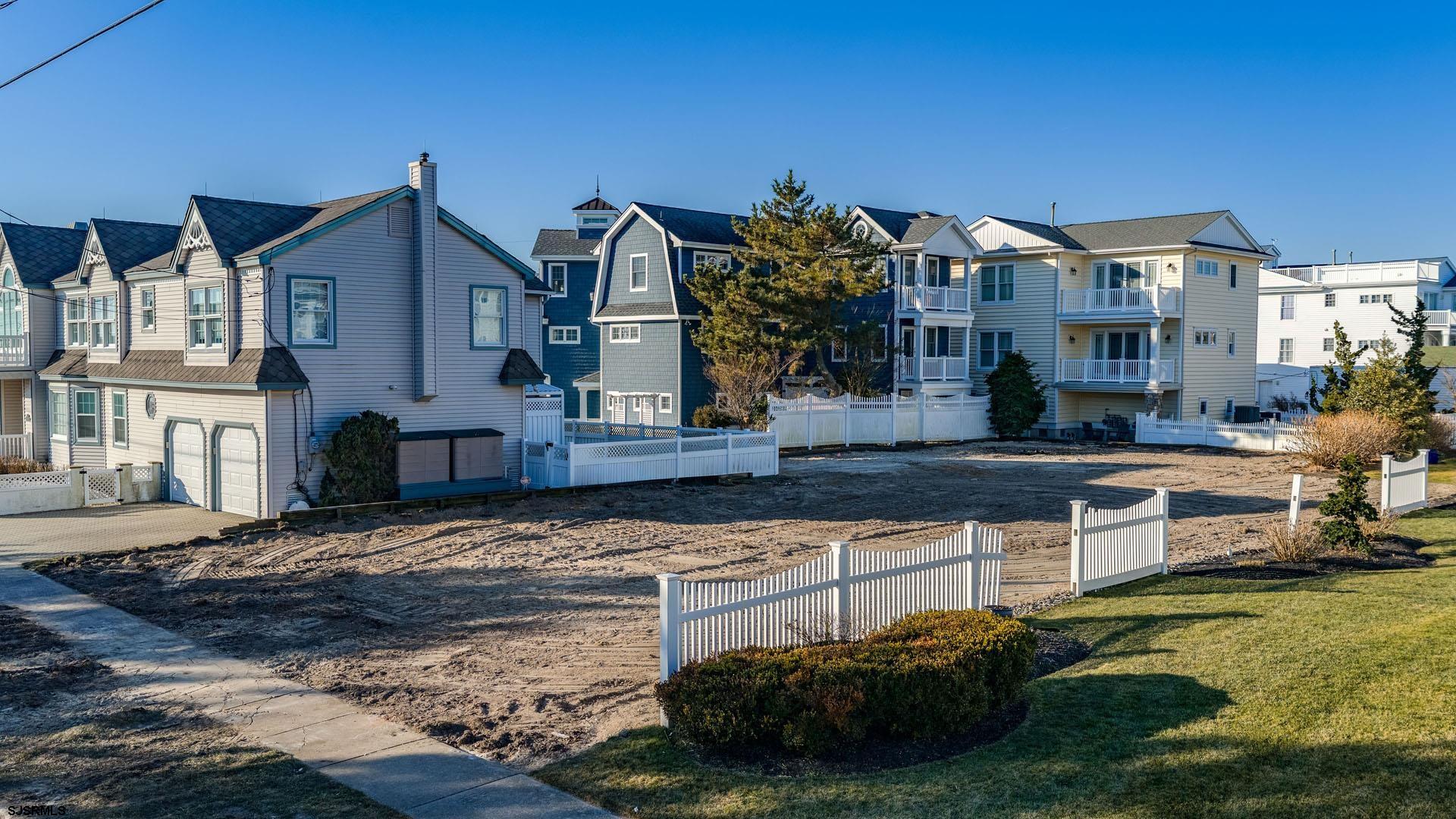 210 Gull Road Ocean City, NJ 08226 - Photo 24 of 34 a front view of a house with garden