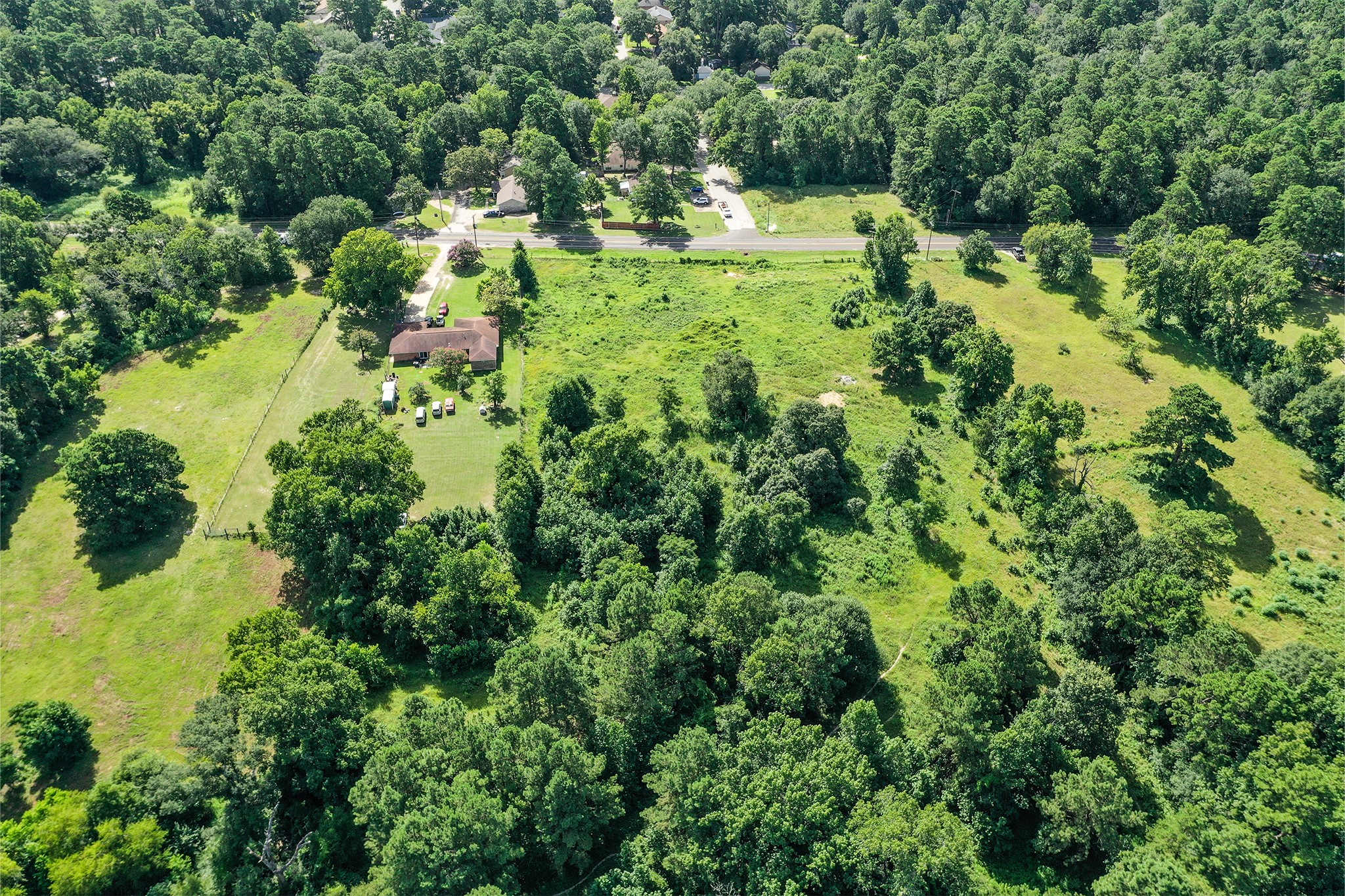 3722 Montgomery Road Huntsville, TX 77340 - Photo 11 of 16 an aerial view of a house with a yard