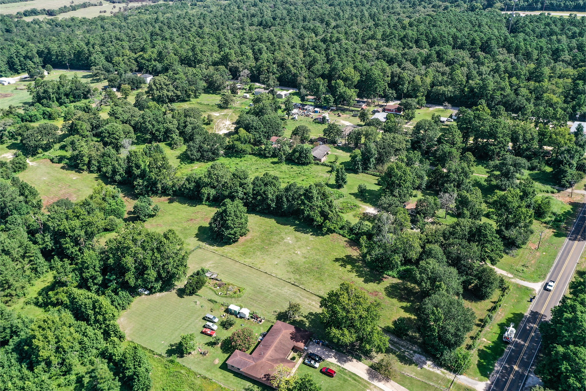 3722 Montgomery Road Huntsville, TX 77340 - Photo 15 of 16 an aerial view of a house with a yard
