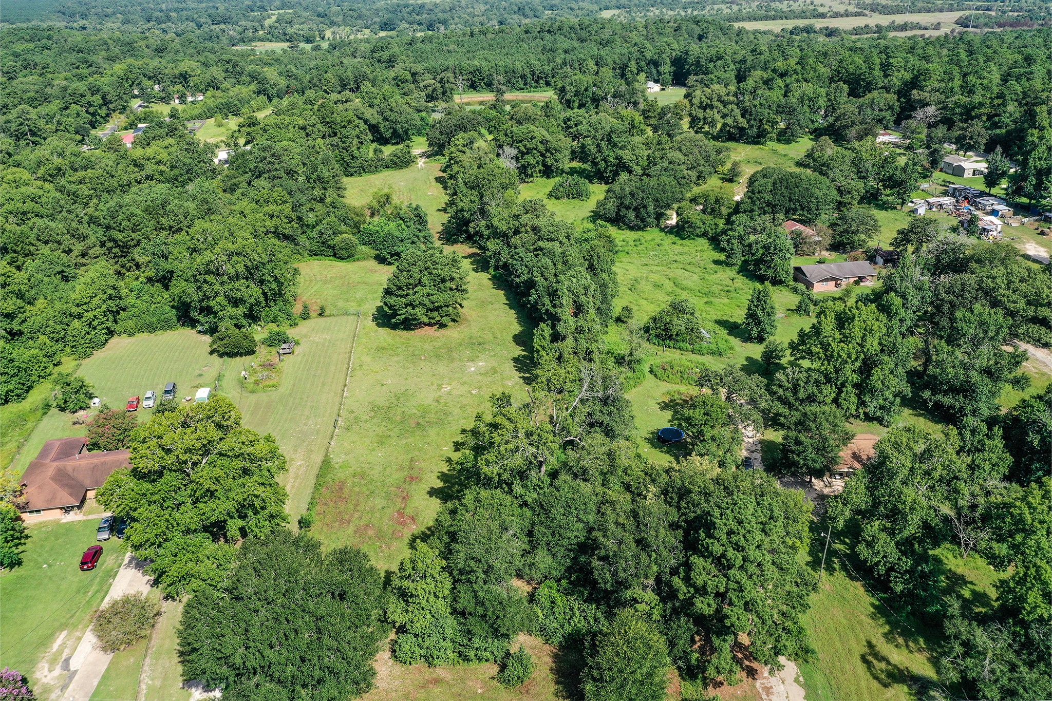 3722 Montgomery Road Huntsville, TX 77340 - Photo 5 of 16 an aerial view of residential house with outdoor space and trees all around