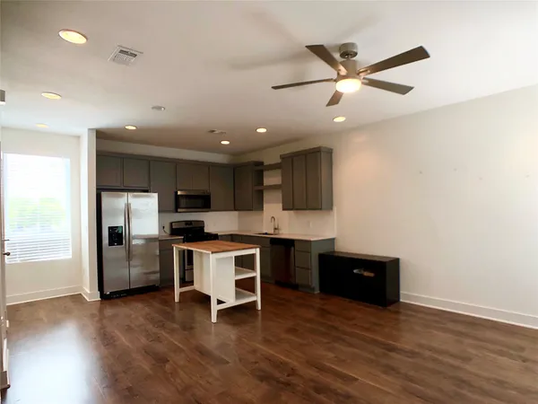 a view of kitchen with microwave and stove