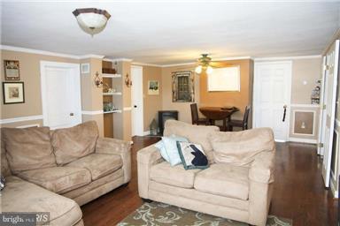 113 South Lightner Street Union Bridge, MD 21791 - Photo 11 of 20 a living room with furniture and a window