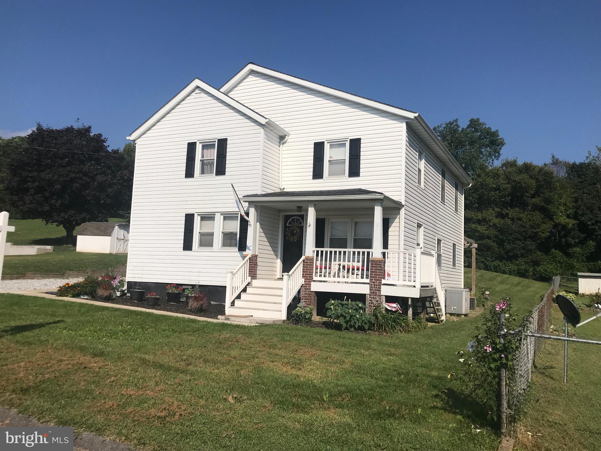 113 South Lightner Street Union Bridge, MD 21791 - Photo 16 of 20 a view of a white house with a yard
