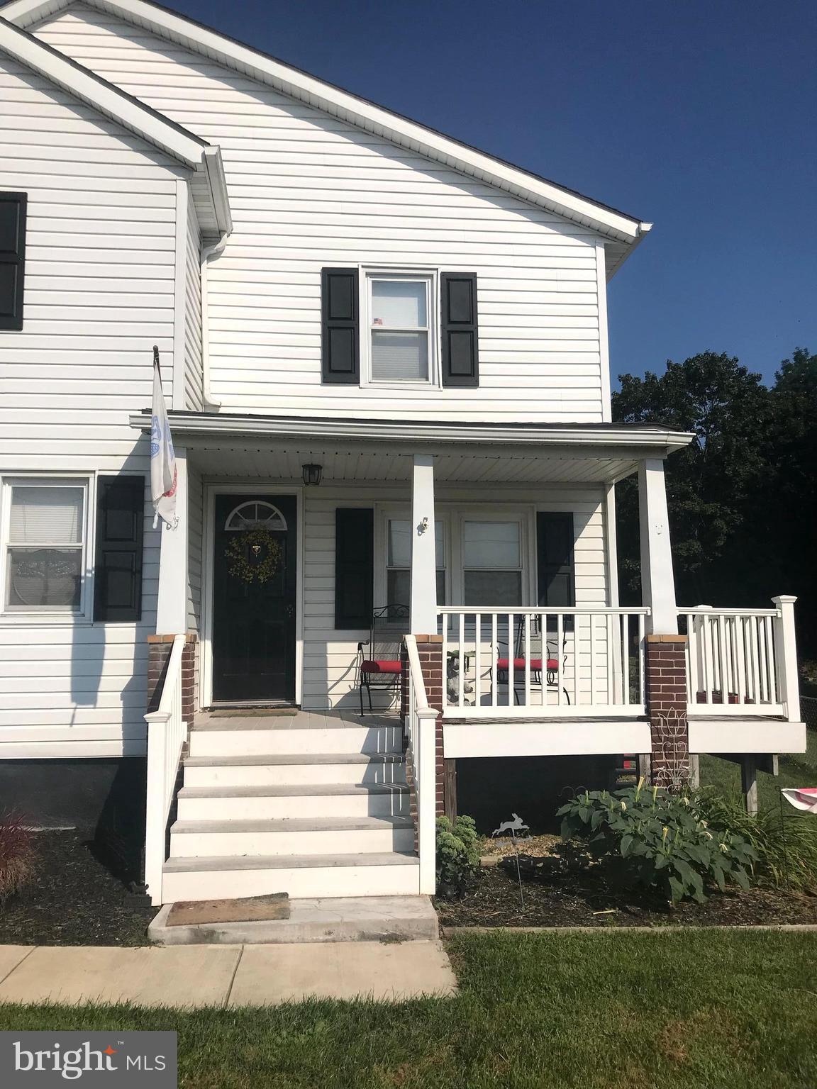113 South Lightner Street Union Bridge, MD 21791 - Photo 4 of 20 a front view of a house with a yard