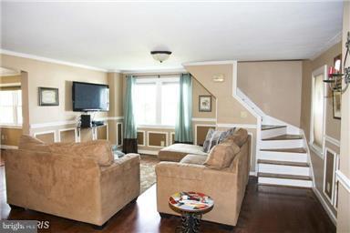 113 South Lightner Street Union Bridge, MD 21791 - Photo 9 of 20 a living room with furniture and a flat screen tv