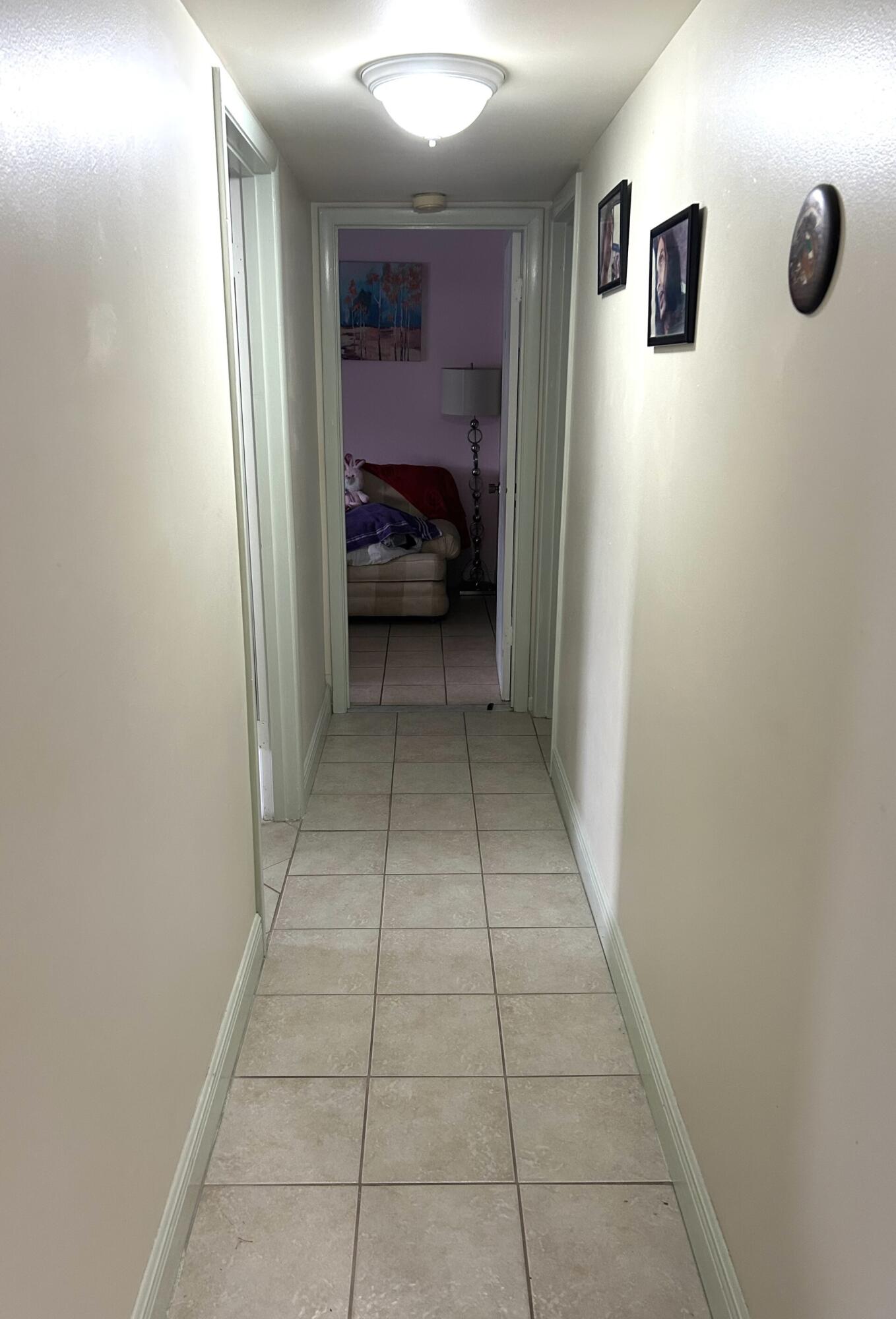 506 Davis Road, Unit 66 Palm Springs, FL 33461 - Photo 5 of 26 a view of livingroom with furniture and window