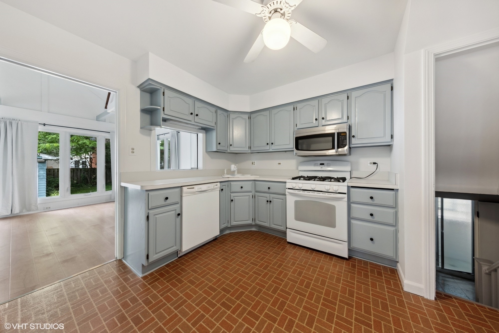 Undisclosed Address Western Springs, IL 60558 - Photo 5 of 15 a kitchen with cabinets stainless steel appliances and a window